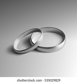 Realistic Silver Wedding Rings Isolated on Background. EPS10 Vector