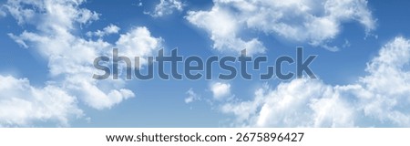 Realistic sky with fluffy white cloud formations - bright blue atmosphere, scattered cumulus in natural daylight scene for outdoor environment, weather backgrounds or landscape design elements.