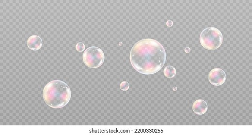 Realistic soap bubbles with iridescent reflection and highlights. On a transparent background.