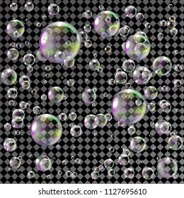 Realistic soap bubbles with rainbow reflection. Isolated on transparent background.