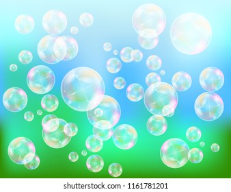 Realistic soap bubbles with rainbow reflection set isolated on the blue sparkling background. vector Illustration