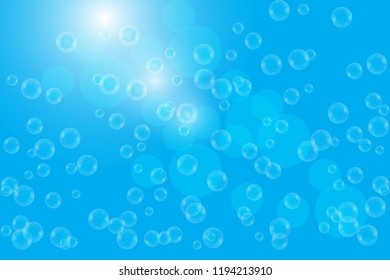 Realistic soap bubbles with rainbow reflection set isolated on the blue background. vector Illustration