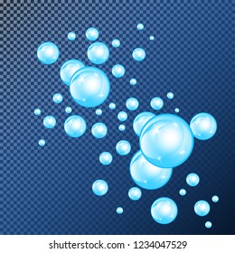 Realistic soap bubbles with rainbow reflection set isolated on the blue transparent background. vector Illustration