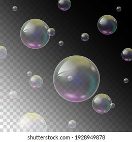 Realistic soap bubbles with rainbow reflection set isolated on a transparent background.