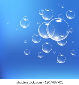 Realistic soap bubbles set isolated on the blue background. vector Illustration