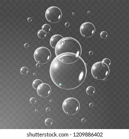 Realistic soap bubbles set isolated on the black transparent background. vector Illustration