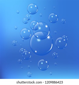 Realistic soap bubbles set isolated on the blue background. vector Illustration
