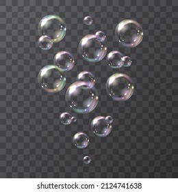 Realistic soap bubbles. Vector illustration of round realistic soap bubbles with rainbow colorful reflection on a transparent background.