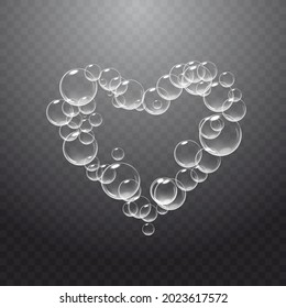 Realistic soap foam with bubbles shaped as heart. Valentine day symbol. Romantic glossy soapy heart. Transparent background.