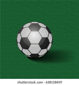 Realistic soccer ball or football ball on green background