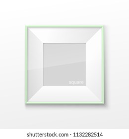 Realistic Square Light Green Color Blank Picture Frame, hanging on a White Wall from the Front. Vector illustration Empty Frame with Shiny Glass. Design Template for Mock Up.