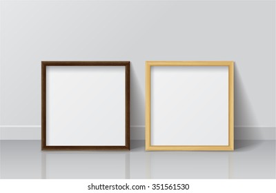 Realistic Square Light Wood and Dark Wood Blank Picture frame, standing on White Floor at
White Wall from the Front. 
Design Template for Mock Up. Vector illustration