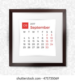 Realistic square picture frame with calendar for September 2017. Isolated on pixel background. Vector illustration.
