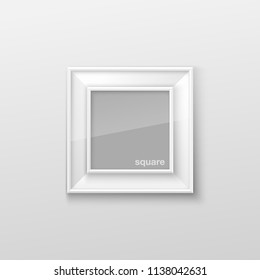 Realistic Square White Blank Picture Frame, hanging on a White Wall from the Front. Vector illustration Empty Frame with Shiny Glass. Design Template for Mock Up.