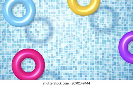 Realistic swimming pool summer background with multicolored floating rubber rings vector illustration. Clear blue water with sun glare at luxury resort backdrop. Shiny ripple aqua wave surface