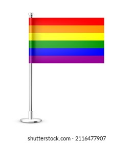 Bandera de mesa realista en un asta de acero cromado. Bandera del escritorio LGBT arcoiris hecha de papel o tela. Luminoso soporte de metal. Tragedia para promoción y publicidad. Ilustración del vector