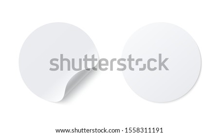 Realistic template of white round paper   adhesive sticker with curved edge isolated on white background.