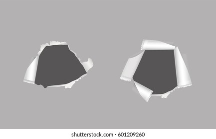 Realistic torn paper with ripped edges. Holes in white paper with torn sides over gray background with space for text