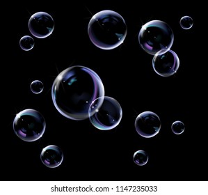 Realistic transparent soap bubbles with rainbow reflection. Isolated set composition.