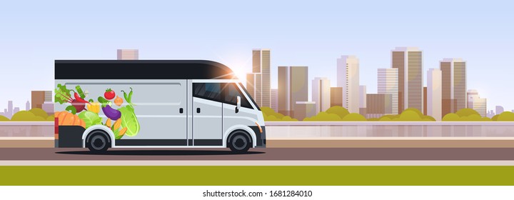 realistic van with organic vegetables on city highway natural vegan farm food delivery service vehicle with fresh veggies cityscape background horizontal flat vector illustration