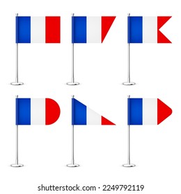 Realistic various French table flags on a chrome steel pole. Souvenir from France. Desk flag made of paper or fabric, shiny metal stand. Mockup for promotion and advertising. Vector illustration