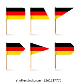 Varias banderas alemanas realistas. Un recuerdo de Alemania. Muelles de madera con bandera de papel. Marca de ubicación, puntero de mapa. Burla en blanco para publicidad y promociones. Ilustración del vector