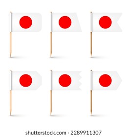 Realistic various Japanese toothpick flags. Souvenir from Japan. Wooden toothpicks with paper flag. Location mark, map pointer. Blank mockup for advertising and promotions. Vector illustration