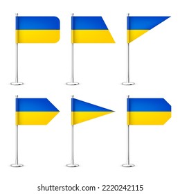Realistic various Ukrainian table flags on a chrome steel pole. Souvenir from Ukraine. Desk flag made of paper or fabric, shiny metal stand. Mockup for promotion and advertising. Vector illustration