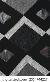 Ilustración vectorial realista textura de tela abstracta.Inserciones detalladas en cuero negro genuino sobre fondo de madera de punto con un patrón abstracto.

