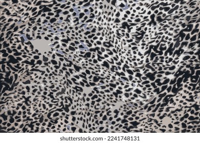 Realistic vector illustration of background with leopard texture, close up. Leopard dyed fabric.
