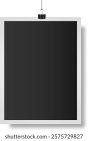 Realistic vector illustration of a blank hanging photo frame with binder clip mockup, dark empty photography template on white background, retro photo memories isolated