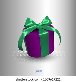 Realistic vector illustration of a gift box with a green ribbon and a bow on a white background. 3D violet box tied with green festive ribbon.