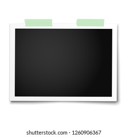 Realistic vector photo frame with straight edges placed horizontally on white by two pieces of green adhesive tape. Template photo design.