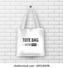 Realistic vector white textile tote bag. Closeup on brick wall background. Design template for branding, mockup. EPS10.