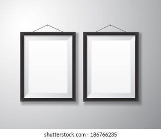 Realistic vertical black picture frames with empty space isolated on white background for presentation and showcasing purposes.