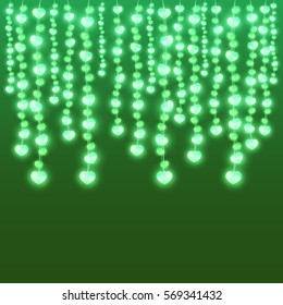 Realistic vertically hanging garlands with lights in shape of heart on green background. Vector illustration.