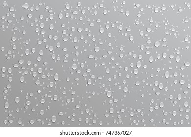 Realistic water droplets on a black background. Vector illustration.