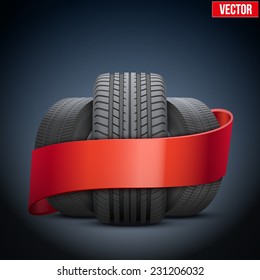 Realistic wheels and tire symbol with ribbon. Front view. Vector Illustration isolated on white background.