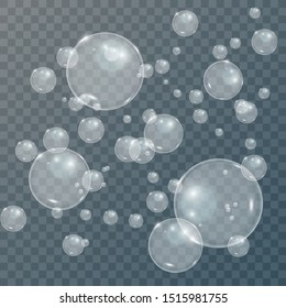 Realistic white bubbles on a transparent background. Vector illustration. Soap bubbles.