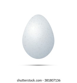 Realistic white egg with shadow, isolated on white