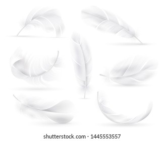 Realistic white feathers. Falling fluffy twirled bird or angel wings feathers. Flying, floating decorative feather vector innocence decoration element shapes plume isolated set