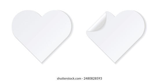 Realistic white heart-shaped stickers with folded corner.