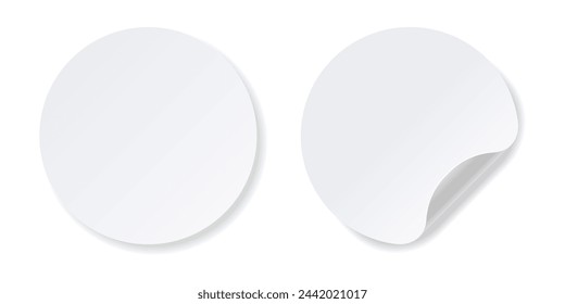 Realistic white round stickers with folded corner.