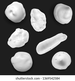 Realistic white smears foam, gel or cream isolated on black background. Set of vector objects different forms.