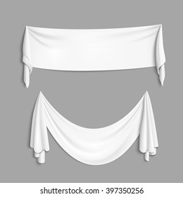 Realistic white textile banners with folds. Vector background