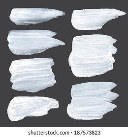 Pintura gruesa blanca y realista se pinta en una superficie oscura