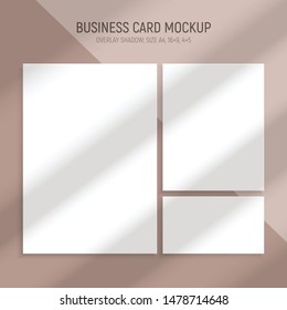 Realistic window light and shadow set of business cards with blank rectangular mockups and shade stripes vector illustration