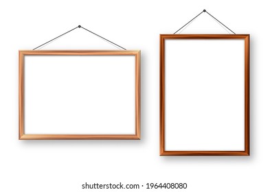 Realistic wooden picture frames with shadow isolated on white background. Hanging on a wall blank poster mockup. Empty photo frame. Vector illustration.