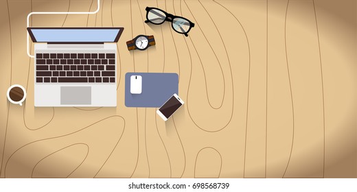 Realistic workplace organization. Top view with wood textured table, laptop, smartphone, glasses,watch, and coffee mug. Work desk for office with stationery elements on the table