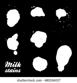 Really milk stains - set of silhouettes. Isolated on black background. Vector. Eps 10